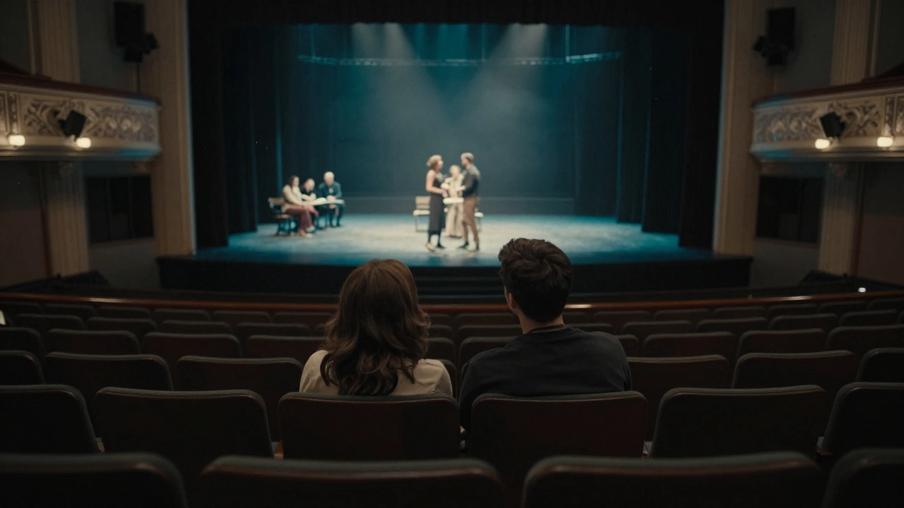 A quiet Monday night audience in a theatre mezzanine, focused on the stage performance.